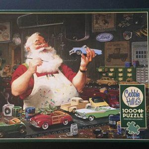 Brand New Cobble Hill 1000 pc Jigsaw Puzzle Santa Painting